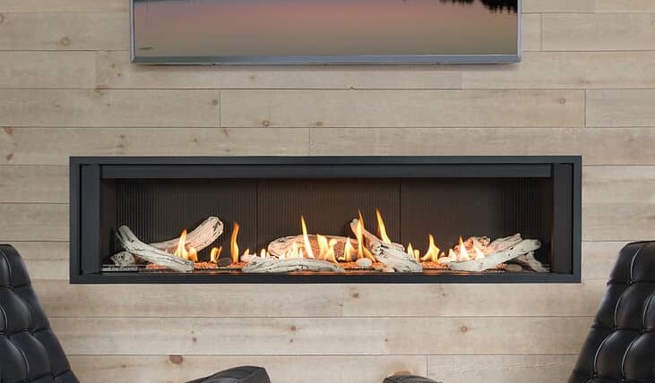 H6 direct vent gas fireplace between two chairs
