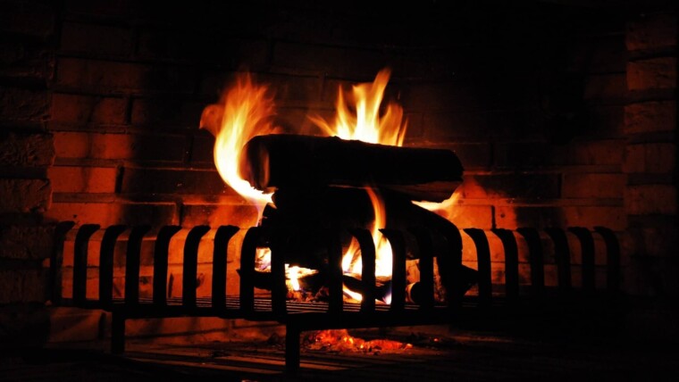 Wood Burning Fireplace Burning in Dark